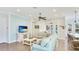 The living room features shiplap accent wall and cozy furniture, creating a relaxing and inviting atmosphere at 283 Saint Lucia Dr # 101, Bradenton, FL 34209