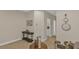 Hallway with decor and access to laundry room with white washer and dryer at 7575 Sea Oak Ct, Parrish, FL 34219