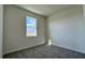 Cozy bedroom features natural light and neutral finishes at 9270 Gulf Haven Dr, Parrish, FL 34219