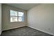 This bedroom features natural light and a neutral interior at 9270 Gulf Haven Dr, Parrish, FL 34219