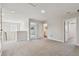 Light and airy bonus room with access to other rooms in the home at 11728 June Briar Loop, San Antonio, FL 33576