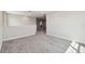 Airy bonus room with neutral paint, carpet and ample natural light at 11728 June Briar Loop, San Antonio, FL 33576