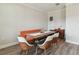 Well-lit dining area features a modern table setting with stylish chairs and ample room at 11728 June Briar Loop, San Antonio, FL 33576