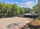 Image of the Community Center, parking lot, and basketball court at 17904 Singing Wood Pl, Lutz, FL 33548