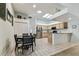 Spacious, bright kitchen with eat in nook features stainless appliances and granite countertops at 17904 Singing Wood Pl, Lutz, FL 33548