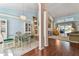Open living space with vaulted ceilings, hardwood floors, and a seamless flow at 17904 Singing Wood Pl, Lutz, FL 33548