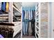 Organized walk-in closet with ample storage and custom shelving at 3320 Prescott N St, St Petersburg, FL 33713