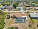 Aerial view of this home with a pool, shed and lovely location in the neighborhood at 3067 Iverson St, Port Charlotte, FL 33952