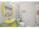 Unique bathroom featuring a bright green sink and a modern design at 3067 Iverson St, Port Charlotte, FL 33952