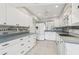 Spacious kitchen equipped with stainless steel appliances and ample cabinet space at 3067 Iverson St, Port Charlotte, FL 33952