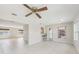Comfortable living area with a ceiling fan and easy access to other parts of the house at 3067 Iverson St, Port Charlotte, FL 33952