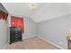 Cozy bedroom featuring neutral carpet, gray walls, and a functional dresser at 4135 Rocky Fork Ter, Ellenton, FL 34222