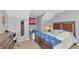 Comfortable bedroom featuring a full-size bed, side table, and desk, all designed for relaxation and productivity at 4135 Rocky Fork Ter, Ellenton, FL 34222