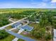 Beautiful aerial view of the property, showcasing the landscaping and a lush green environment at 11344 Gallinule Ave, Weeki Wachee, FL 34613