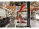 Bright garage workshop with pegboard walls, tools, and lift for auto servicing at 4125 Worcester Rd, Sarasota, FL 34231