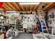 Spacious garage workshop with work benches, tools, pegboard, and mechanic's lift for auto servicing at 4125 Worcester Rd, Sarasota, FL 34231