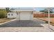 Detached garage with a convenient carport and ample parking space at 4125 Worcester Rd, Sarasota, FL 34231