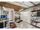 Spacious garage featuring durable flooring, ample storage, and workspace at 4125 Worcester Rd, Sarasota, FL 34231