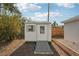 Cozy shed with a ramp for access and surrounded by lush greenery at 4125 Worcester Rd, Sarasota, FL 34231