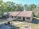 Charming exterior of a single-story home featuring a carport and a well-maintained front yard at 6175 Beechwood Dr, Dade City, FL 33523