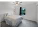 Comfortable bedroom with neutral tones, a serene view, and carpeted floors, creating a cozy retreat at 17677 Nectar Flume Dr, Land O Lakes, FL 34637