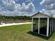 This property features a beautiful community garden with raised beds and a chicken coop at 17677 Nectar Flume Dr, Land O Lakes, FL 34637