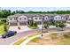 Charming townhome community featuring craftsman-style architecture and attached garages at 17677 Nectar Flume Dr, Land O Lakes, FL 34637