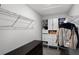 Organized walk-in closet with shelves, drawers, and hanging space, offering ample storage solutions at 17677 Nectar Flume Dr, Land O Lakes, FL 34637