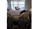 Serene main bedroom featuring a decorative quilt and relaxing views at 4310 Falmouth Dr # 301, Longboat Key, FL 34228