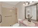 Bathroom featuring shower, grab bar, toilet, and vanity with mirror at 4804 Myrtle Oak Dr # 11, New Port Richey, FL 34653