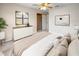 Comfortable bedroom with ceiling fan, closet, and decoratively appointed with stylish furniture and wall art at 4804 Myrtle Oak Dr # 11, New Port Richey, FL 34653