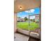 Relax on this screened patio area overlooking the green common areas and community buildings at 4804 Myrtle Oak Dr # 11, New Port Richey, FL 34653