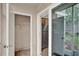 View of the kitchen through a patio sliding glass door at 4804 Myrtle Oak Dr # 11, New Port Richey, FL 34653
