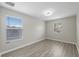 The new bedroom features hard surface floors and lots of light at 12534 Chenwood Ave, Hudson, FL 34669