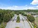 Image shows the gated entrance to the residential community at 12534 Chenwood Ave, Hudson, FL 34669