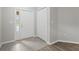 Inviting foyer with tile and wood flooring and closet at 12534 Chenwood Ave, Hudson, FL 34669