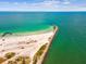 Stunning aerial view of the pristine white sand beaches of Sand Key Park at 1400 Gulf Blvd # 701, Clearwater Beach, FL 33767