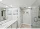 The bathroom offers a walk-in shower, a large mirror, vanity, and ample space at 1400 Gulf Blvd # 701, Clearwater Beach, FL 33767