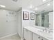 Bright bathroom with lots of vanity space and walk-in shower at 1400 Gulf Blvd # 701, Clearwater Beach, FL 33767