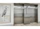 Hallway with elevators and heron art print at 1400 Gulf Blvd # 701, Clearwater Beach, FL 33767