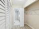 Hallway leading to bathroom with ample closet storage at 1400 Gulf Blvd # 701, Clearwater Beach, FL 33767