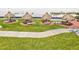 Well-maintained lawn featuring multiple tiki huts with seating areas and walkways at 1400 Gulf Blvd # 701, Clearwater Beach, FL 33767