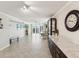 Bright and airy living room with tile floors, contemporary furnishings, and large windows overlooking the Gulf at 1400 Gulf Blvd # 701, Clearwater Beach, FL 33767