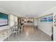 Open floor plan with dining, kitchen, and living space, offering a seamless flow and ample natural light at 1400 Gulf Blvd # 701, Clearwater Beach, FL 33767