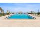Beautiful pool area with tiki huts and lounge chairs for residents to enjoy at 1400 Gulf Blvd # 701, Clearwater Beach, FL 33767