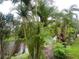 A lush backyard water view from this home offers plenty of space and privacy at 401 Sunset Dr, Venice, FL 34285