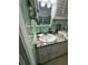 Updated bathroom features a modern vanity with granite countertop and stylish fixtures at 401 Sunset Dr, Venice, FL 34285
