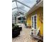 This home offers a covered, screened patio and a beautifully tiled floor for elegant outdoor living at 401 Sunset Dr, Venice, FL 34285
