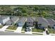 An aerial shot showcases residences with well-maintained lawns, driveways, and landscaping at 3270 Rock Sound St, Bradenton, FL 34208