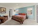 Bright bedroom with Southwestern-themed decor and two windows at 3270 Rock Sound St, Bradenton, FL 34208